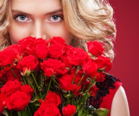 Beautiful blonde woman holding bouquet of red roses HD picture 03