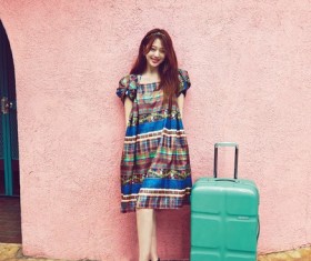 Beautiful girl with traveler Stock Photo