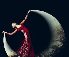 Beauty women lying on the crescent moon Stock Photo 01