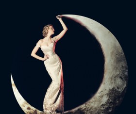 Beauty women lying on the crescent moon Stock Photo 02