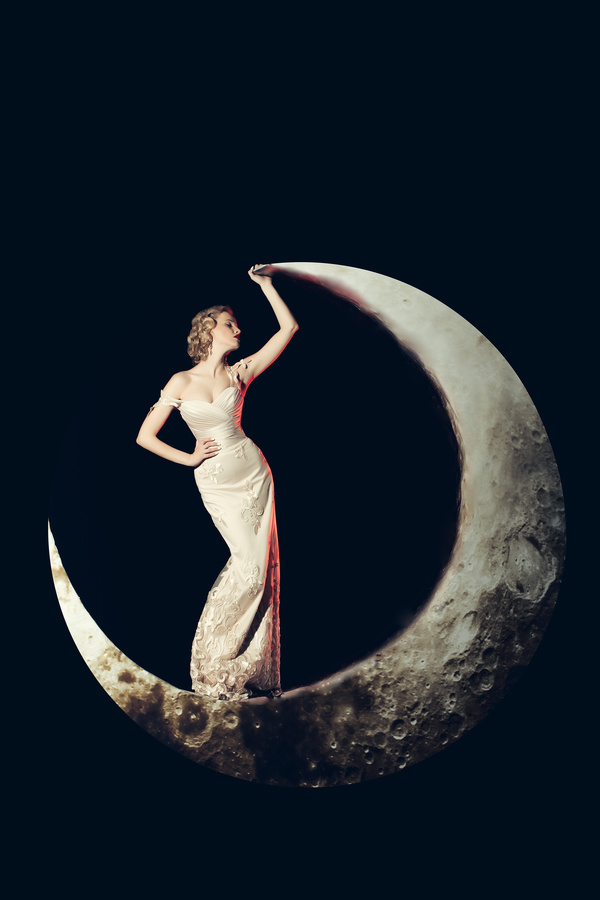 Beauty women lying on the crescent moon Stock Photo 02