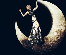 Beauty women lying on the crescent moon Stock Photo 03