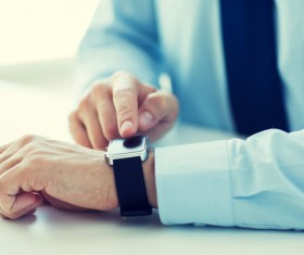 Businessman with Smart Watches Stock Photo 02