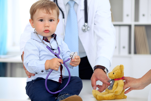 Children with stethoscope in the hospital Stock Photo
