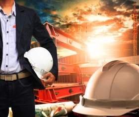 Civil engineer working table with safety helmet Stock Photo 01