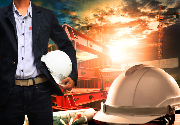 Civil engineer working table with safety helmet Stock Photo 01