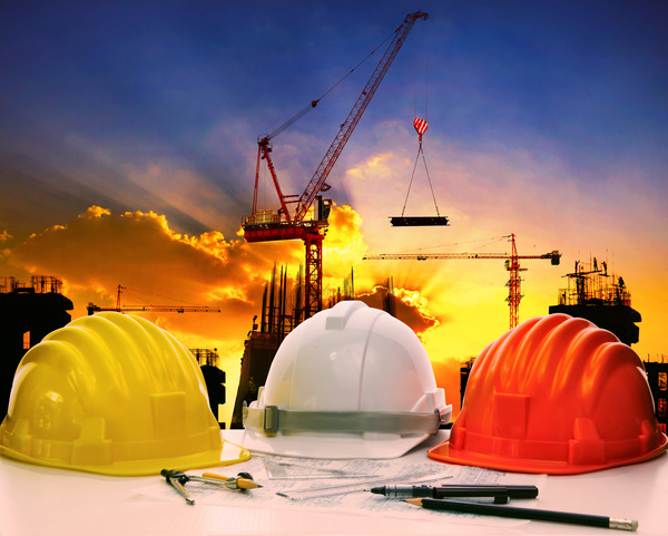 Civil engineer working table with safety helmet Stock Photo 02