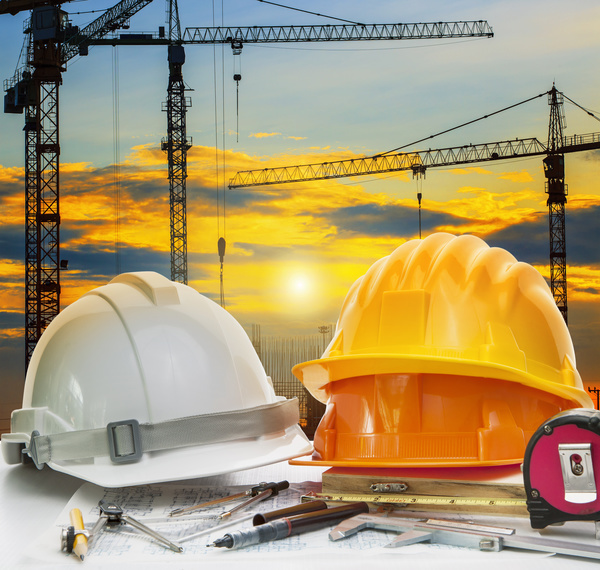 Civil engineer working table with safety helmet Stock Photo 03