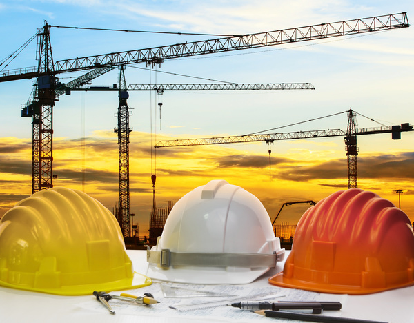 Civil engineer working table with safety helmet Stock Photo 04