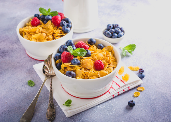 Corn flakes with berries and milk Stock Photo 01