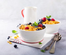 Corn flakes with berries and milk Stock Photo 02
