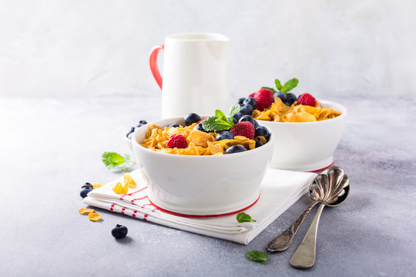 Corn flakes with berries and milk Stock Photo 02