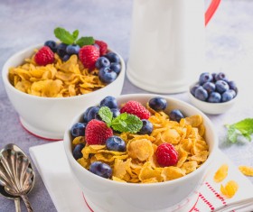 Corn flakes with berries and milk Stock Photo 03