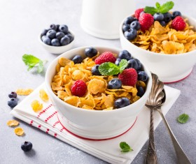 Corn flakes with berries and milk Stock Photo 05