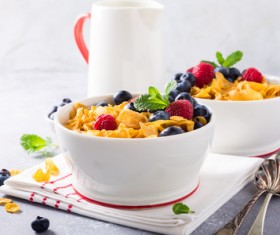 Corn flakes with berries and milk Stock Photo 06