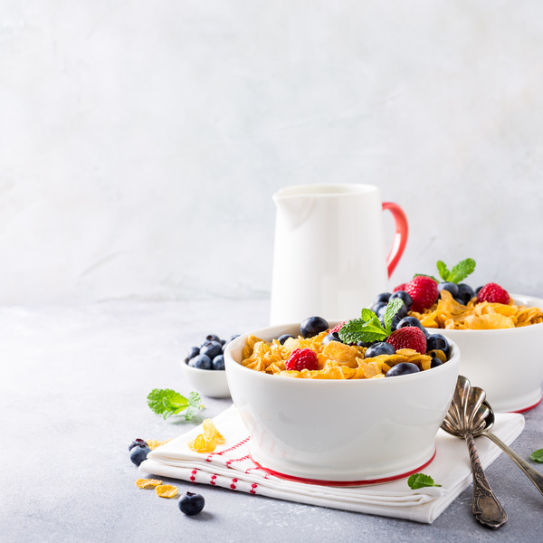 Corn flakes with berries and milk Stock Photo 09