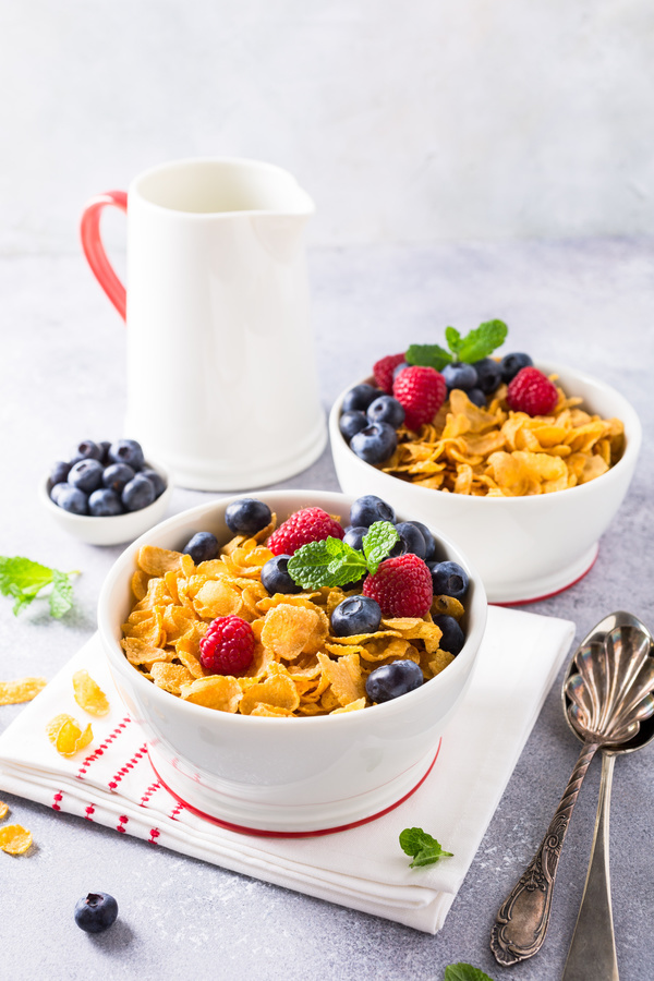 Corn flakes with berries and milk Stock Photo 12