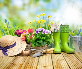 Desktop on the boots with straw hat and flower background HD picture