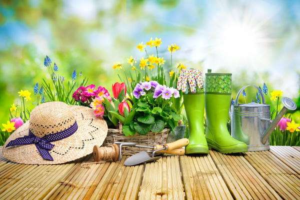 Desktop on the boots with straw hat and flower background HD picture