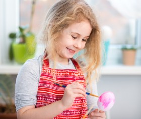 Do Easter eggs little girl Stock Photo 01