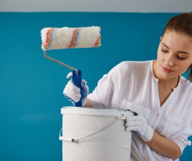 Equipped with painted wall of the family of women Stock Photo