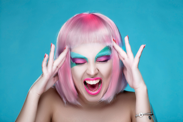 Exaggerated make-up and facial expressions girl Stock Photo 15