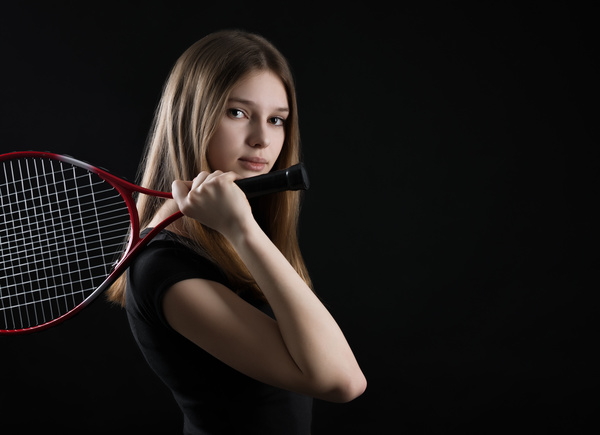 Girl holding a tennis racket HD picture