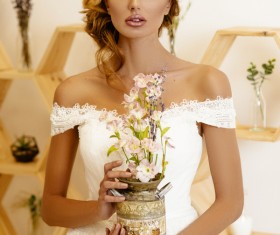 Hand holding a flower pot of dignified beauty woman Stock Photo 01