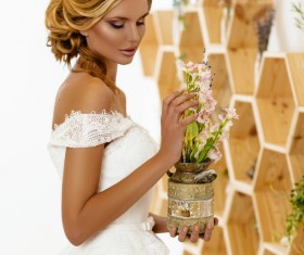 Hand holding a flower pot of dignified beauty woman Stock Photo 02