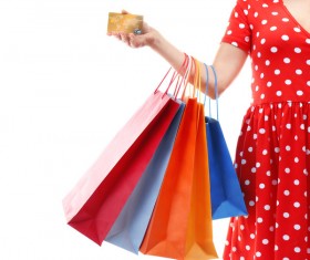 Holding a shopping bag with a bank card for a woman Stock Photo 07