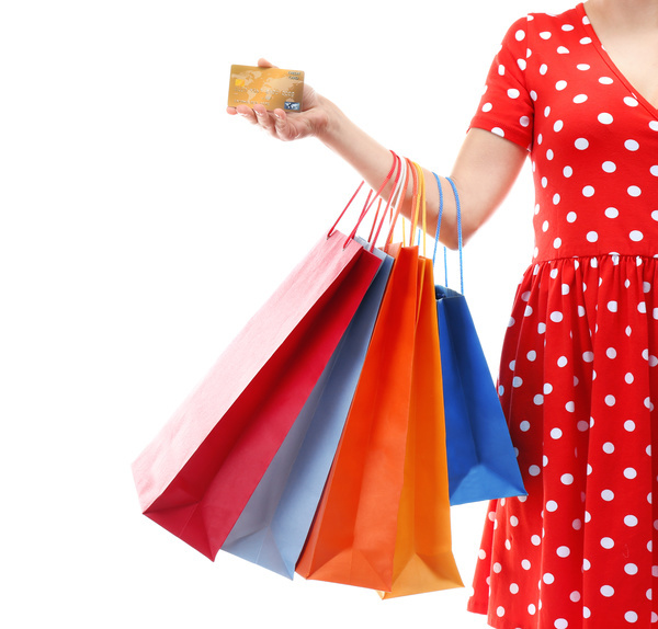 Holding a shopping bag with a bank card for a woman Stock Photo 07