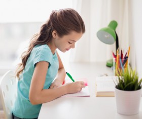 Homework little girl Stock Photo