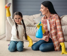 Mom and daughter cleaning house Stock Photo 01