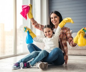 Mom and daughter cleaning house Stock Photo 03