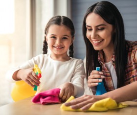 Mom and daughter cleaning house Stock Photo 07