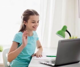 Online video call to the little girl Stock Photo