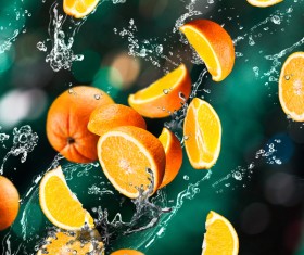 Oranges and splashing water Stock Photo 01