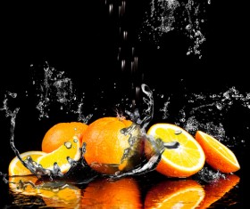 Oranges and splashing water Stock Photo 03