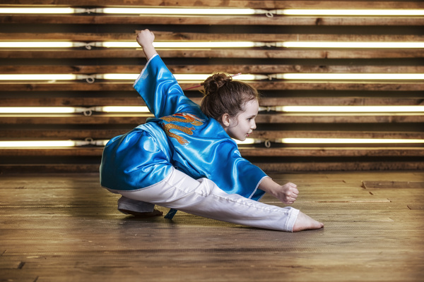 Practicing Chinese martial arts girl Stock Photo
