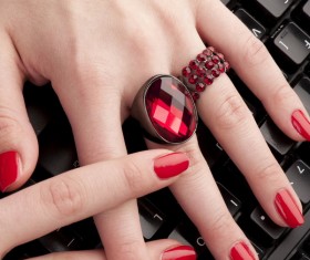 Red nail with keyboard Stock Photo