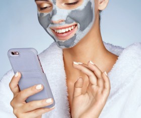 Skin care and play smart phone girl HD picture 01