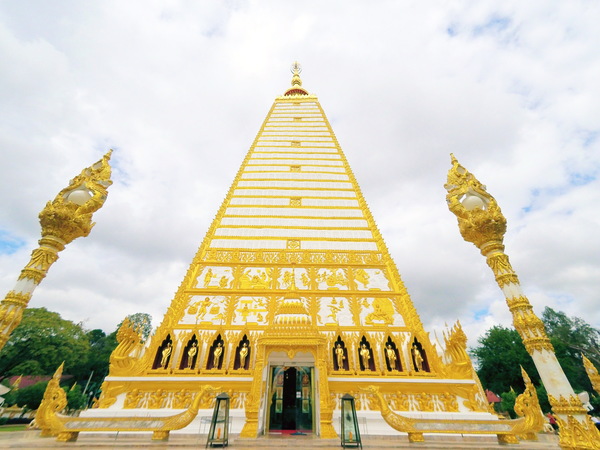 Thailand golden yellow temple building Stock Photo