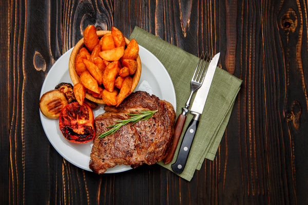 The steak with vegetables Stock Photo