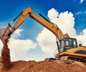 Work in the excavator Stock Photo