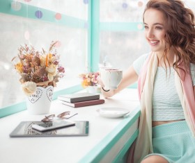 beautiful young woman in a cafe HD picture