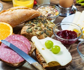 Almond bread with oranges and jam Stock Photo