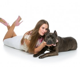 Beautiful girl with gray Stafford dog Stock Photo
