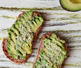 Black bread with avocado Stock Photo