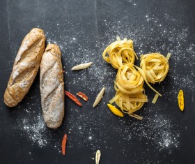 Black bread with spaghetti Stock Photo