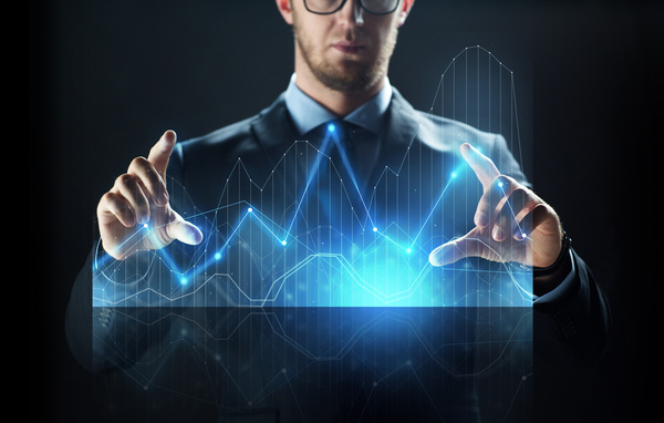 Businessman with virtual charts Stock Photo 01